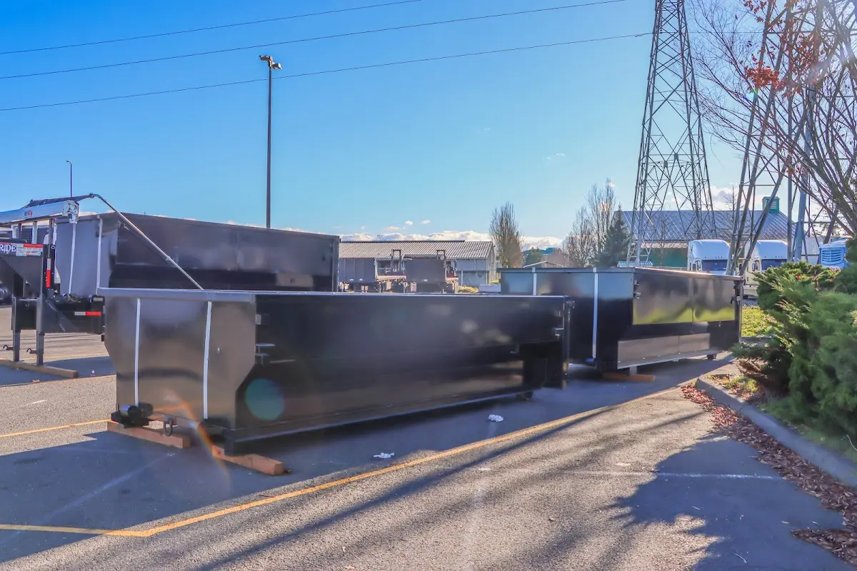 Roll-off dumpster ready for waste disposal at job site for 2 Yard Dumpster Rental in Farmersville